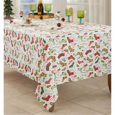 a table covered with christmas decorations and candles