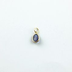 Material: 14k solid yellow gold (not gold plated or gold filled) Main Stone: Sapphire Main Stone Color: Blue Main Stone Shape: Oval Main Stone Creation: Natural Stone Size: 7x5 mm Carat Weight: 1.14 Carats Minimalist 14k Gold Oval Cabochon Jewelry, Minimalist Yellow Gold Cabochon Jewelry, Everyday 14k Gold Oval Cabochon Jewelry, Dainty 14k Gold Oval Cabochon Jewelry, Everyday 14k Gold Jewelry With Oval Cabochon, Dainty Yellow Gold Oval Cabochon Jewelry, Oval Birthstone Jewelry In Recycled Gold, Oval Birthstone Jewelry For Memorial, Oval Birthstone Jewelry For Memorials