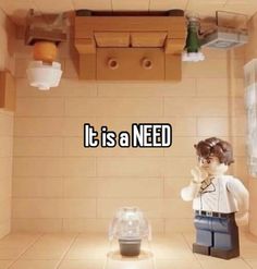 there is a lego man standing in the bathroom