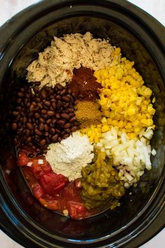 an image of food in the crock pot with beans and other ingredients to make it