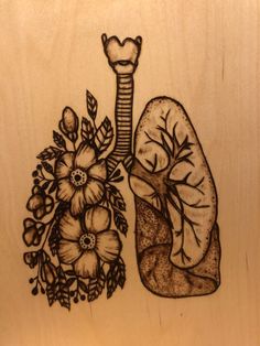 a drawing of the lungs and flowers