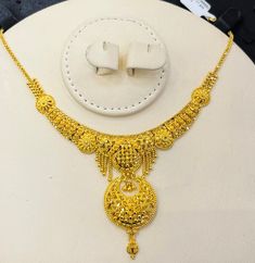 "Indian designer choker necklace , 916 Yellow Gold GOLD PURITY : pure 22k / 916 gold purity Appx Weight: 17.70grams Length : 16-17\" inches Length Colour : YELLOW GOLD Hallmark: Hallmarked 916 stamp Hook: '' fish hook Design :Beautiful choker necklace indian style pendant necklace set. Authentic 916 Gold FAQs Q: Is it real gold? A: yes it's real authentic genuine 916 gold Q: can pawn? A: yes it's pawnable ⭐️GoForGold⭐️ It's time to stock up gold" Luxury Yellow Gold Filigree Bridal Necklace, Luxury Yellow Gold Choker For Wedding, Luxury Yellow Gold Temple Necklace For Rituals, Luxury Yellow Gold Kundan Pendant Necklace, Luxury Yellow Gold Temple Necklace With Intricate Design, Luxury Yellow Gold Kundan Temple Necklace, Luxury Yellow Gold Kundan Necklace For Celebration, Luxury 22k Gold Yellow Temple Necklace, Luxury Yellow Gold Temple Necklace For Puja