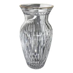 a clear glass vase sitting on top of a table