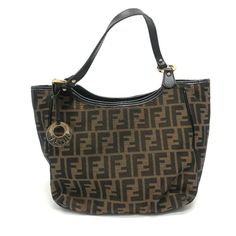 Item Information ITEM NO.: G-201025-38 NAME: FENDI Zucca logo Logo charm Shoulder Tote Bag SHAPE: Shoulder Bag MODEL NO.: 8BH156 COLOR: Brown / BrownBased x GoldHardware MATERIAL: 2789 APPROX SIZE: W10.6 x H9.3 x D3.7inch / W27cm x H23.5cm x D9.5cm Gender: Women's Spec: [Open type]fastener [Outside] Open pocket x 2 [Inside] Open pocket x 1 ADDITIONAL ITEMS: None ITEM RANK: Used AB Rank CONDITION DETAILS: Handle - Strap:cracking,Cracking on the edges Corners and edges:scrub Metal fittings part:Mi Fendi Tote Bag, Fendi Tote, Bags Logo, Shoulder Tote Bag, Fendi Bags, Black Tote Bag, Shoulder Tote, Canvas Leather, Prada Bag