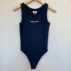 Tommy Jeans Navy Blue Bodysuit Size Xs Embroidered Tommy Logo On Front. Red & White Stitching Down The Sides. Although Tags Were Removed, This Was Never Worn & Is In Excellent Condition Navy Blue Bodysuit, Navy Bodysuit, Blue Bodysuit, Tommy Hilfiger Tops, Tommy Jeans, Red White, Red And White, Tommy Hilfiger, Stitching