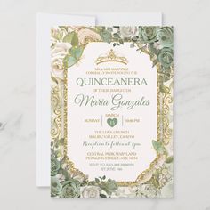 an ornate wedding card with roses and greenery on the front, in gold foil