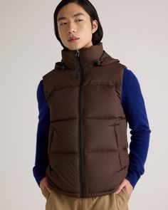 The perfect vest for your cold-weather adventures is here: our Responsible Down Puffer Vest. You'll be warm and protected in all types of weather, and the water-repellent and wind-resistant fabric make this vest perfect for any winter activity. The classic fit allows extra room for layering, so you can wear it as a layering piece in cooler temperatures, or with a lightweight tee as the temperature rises. Plus, our down products are sourced responsibly to ensure best practices in animal welfare. Fall Vest With Detachable Hood, Sleeveless Vest With Detachable Hood For Fall, Fall Sleeveless Vest With Detachable Hood, Winter Functional Solid Vest, Functional Solid Winter Vest, Sleeveless Outdoor Outerwear With Padded Collar, Sleeveless Outerwear With Padded Collar For Outdoor, Functional Solid Color Winter Vest, Outdoor Puffer Vest Jacket Sleeveless