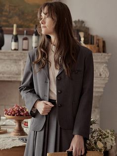 This is a basic blazer made with 100% polyester that is flexible and light. It features three buttons and practical pockets at the front.- Appropriate length allowing for versatile looks- Semi-oversized fit for comfortable wear experience- Modern gray color to add appeal to the item Professional Fall Outerwear With Suit Collar, Single Breasted Button-up Outerwear, Professional Button-up Outerwear For Office, Professional Outerwear With Hidden Button Closure For Office, Fall Single Button Sport Coat For Office, Fall Single-breasted Sport Coat For Office Wear, Fall Office Wear Sport Coat Single Breasted, Long Sleeve Sport Coat With Buttons For Work, Solid Office Style Blazer For Fall