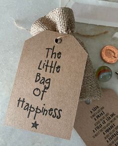 a tag that says the little bag of happiness