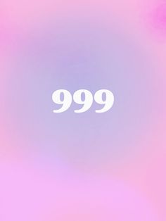 a blurry background with the number 999 in white on pink and purple hues