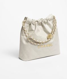 Chanel 22 small handbag, Shiny calfskin & gold-tone metal , light gray — Fashion | CHANEL Chanel 22, Moda Chanel, Chanel Watch, Jewelry Advice, Eyewear Shop, Fashion Chanel, Chanel Collection, Chanel Couture, Chanel Official