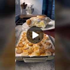 two pans filled with food sitting on top of a counter