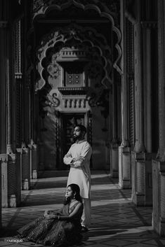 black and white photograph of two women in an ornate building