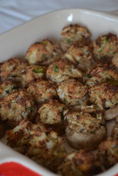 a casserole dish filled with cooked mushrooms