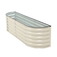 a white rectangular tub with black trim on the sides and bottom part in an angled position