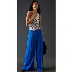 Anthropologie Low-Rise Blue Pleated Satin Pants - Size 12 Enjoy The Comfort Of These Low-Rise Blue Silky Pleated Pants By Anthropologie Size 12 In Women's. With A Flowing Silhouette, You Will Love Their Versatility. The Material Is Viscose. Measurements: 9.75" Rise 32" Inseam 14.75" Leg Opening 17" Waist Lying Flat Perfect For Special Occasions Or Daily Wear. It's A Gorgeous Blue! These Anthropologie Satin Pants Come With Side Slant Pockets, Zip Front, And Welt Pockets In The Back And Are A Size Boho Loungewear, Striped Flare Pants, Silky Pants, Grey Cargo Pants, Tie Waist Jumpsuit, Size 12 Women, Wide Leg Crop Pants, Striped Wide Leg Pants, Satin Pants