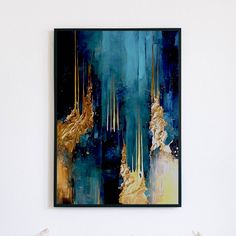 an abstract painting hangs on the wall above a bed in a room with white walls