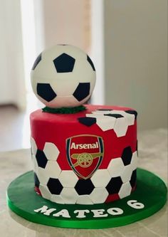 there is a soccer cake on the table