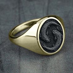 Pisces - The Fish: You are imaginative, selfless, and sensitive. Your compassion and understanding lead you to put others' needs before your own. You do not criticize others for their faults, but instead, accept people for who they are. 16mm oval signet ring 10K Yellow Gold with Tantalum Grey center Available in 2 fits: Luxe and Basic Available in 2 finishes: Satin and Polish Oval Signet Ring, Accessorize Jewellery, Edgy Jewelry, Mens Rings Fashion, Signet Ring Men, Coin Ring, Ring Shapes, Zodiac Symbols, Round Rings