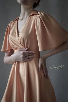 This luxury exclusive design midi dress is perfect for any events outfit or casual work outfit.100 % designed and handmade by Emsilk. I am pleased to offer your garments made to measure at no extra cost. All of my designs can be made in any colors that you see in my shop.Link to all colors in pure silk: https://www.etsy.com/shop/emsilkdesign?ref=seller-platform-mcnav&section_id=28483599* Detail: - V neckline wrapped- Pleated detail on waist- Small collar- Fully lined- Puffed sleeves- Invisib Chic A-line Wrap Dress For Formal Occasions, Elegant A-line Wrap Dress For Evening, Elegant A-line Maxi Dress For Office, Elegant Solid V-neck Midi Dress, Elegant V-neck Maxi Dress For Office, Elegant Solid Color Wrap Dress For Party, Elegant Short Sleeve Maxi Dress For Office, Elegant Solid Color Party Wrap Dress, Feminine Short Sleeve Party Wrap Dress