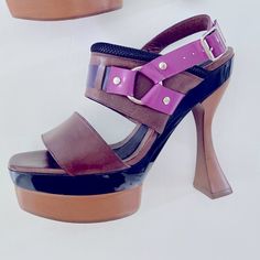 Gorgeous Marnie Leather Horse Bit Brown Purple And Black Platform Heels Sandals. Silvertone Hardware. Black Mesh Trim At Uppers. Buckle Closures Around Ankle. Leather Insole, Wooden Heel. New With Tags Never Worn