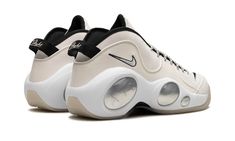 The Nike Zoom Flight 95 “Pale Ivory” is a versatile, go-anywhere colorway of the retro basketball shoe.  The Zoom Flight 95 debuted as a performance hoops shoe in 1995 before returning to the modern scene in a collaboration with Supreme in 2022.  The “Pale Ivory” features a cream-colored synthetic upper with a tonal leather mudguard overlay.  A white Swoosh is embroidered on the sides.  The Zoom Flight 95’s signature “bug eyes” appear in a milky, semi-translucent hue on the sides.  Release date: May 5, 2023 Bug Eyes, Modern Scene, Ivory Shoes, Retro Basketball Shoes, Retro Basketball, Stadium Goods, S Signature, May 5, Nike Zoom