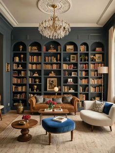 a living room filled with furniture and bookshelves covered in lots of bookcases