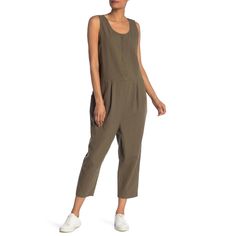 Brand: Eileen Fisher Type: Jumpsuit Style: Sleeveless Size: Medium Condition: Brand New W/ Tag - Has A Retail Price Tag Of $228 Color: Olive Green Material: 86% Organic Cotton, 7% Linen, 7% Ramie Description: Jumpsuit Is A Scoop Neck And Has Front Slash Pockets. Has Hidden Sided Zip Closure And Front & Back Waist Pleats. Style Runs Large. Measurements: Waist (Un-Stretched): 21.5" Waist To Bottom: 35.5" Inseam: 21" Rise: 14.5" Full Length From Collar To Hem: 55" Sleeveless Jumpsuits And Rompers For Daywear, Chic Sleeveless Jumpsuits And Rompers For Day, Sleeveless Overalls For Spring Workwear, Spring Sleeveless Overalls For Workwear, Chic Sleeveless Overalls For Workwear, Olive Jumpsuit, Jumpsuit Style, Pleated Jumpsuit, Silk Jumpsuit