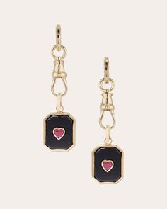 Attached to the hoops with Ashley Zhang's signature dog clip clasp, these 14-karat gold earrings detail their octagonal drops with inlaid black onyx and beaded milgrain trim. The heart-cut ruby centers are placed in classic bezel settings for a vintage look. Hinge closure Detachable charm drops 14k yellow gold, black onyx and ruby Carat: 0.4 ctw ruby Polish with soft cloth Handmade in the USA Measurements Width: 0.47in Length: 1.06in Convertible Earrings, Ruby Heart, Dog Clip, Bezel Setting, Vintage Look, Black Onyx, Gold Black, Gold Earrings, Onyx