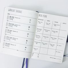 an open planner with the words workout schedule written on it