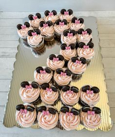 cupcakes are arranged in the shape of a heart