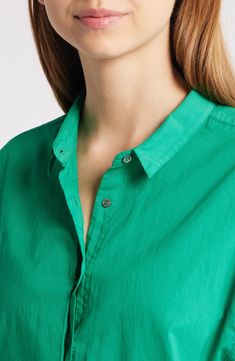 Polished yet relaxed, this work-to-weekend shirt is crafted from breezy cotton and framed by abbreviated, cuffed sleeves. 29" length Front button closure Spread collar Short sleeves with rolled cuffs 100% cotton Machine wash, tumble dry Made in the USA Green Cotton Top With Rolled Sleeves, Green Shirt With Button Cuffs For Daywear, Green Cotton Blouse With Placket, Green Cotton Shirt With Shirttail Hem, Green Relaxed Fit Shirt With Shirttail Hem, Green Shirt With Placket For Daywear, Green Relaxed Fit Shirt With Button Cuffs, Green Shirt With Button Cuffs And Relaxed Fit, Casual Green Blouse With Spread Collar