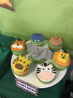 there are many cupcakes that have animals on them