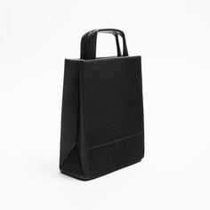 Nwt. Zara Man Black Origami Mini Tote Bag. Semi-Rigid Exterior. Main Pocket With Magnetic Closure. Two Handles And An Adjustable And Detachable Shoulder Strap. Height X Length X Width: 7.1 X 5.9 X 2.4 Inches (18 X 15 X 6 Cm). Ref. 3612/020. Zara Tote Bags, Cross Shoulder Bags, Leather Duffel Bag, Leather Duffel, Zara Bags, Beige Bag, Barrel Bag, Man Black, Leather Belt Bag