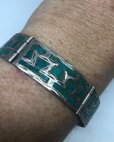 Gorgeous wide Native American style bracelet Sterling Silver Turquoise Inlay work 7.5 inches long 3/4 inch wide All jewelry is shipped in a nice gift box. Check out our over a THOUSAND great reviews Engraving is $4 per letter and is not always perfect depending on the piece. It can take a few days if the jeweler is busy. This is payable to Paypal Judithsltd@gmail.com Engraved Turquoise Sterling Silver Bracelet Gift, Traditional Turquoise Bracelet With Inlay, Artisan Turquoise Bracelet With Inlay, Artisan Turquoise Bracelets With Inlay, Southwestern Sterling Silver Bracelet With Turquoise Inlay, Southwestern Inlay Cuff Bracelet Gift, Southwestern Turquoise Inlay Sterling Silver Bracelet, Southwestern Turquoise Inlay Bracelet, Southwestern Style Turquoise Inlay Bracelets