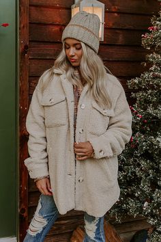 - Be ski resort ready with this cozy jacket! - Fully lined sherpa material - A collared neckline - A buttoned front Functional chest pockets as well as low side pockets - Long, loose sleeves with button closure cuffs - A relaxed silhouette that ends in a rounded hemline Measurements S : Bust 45", Hip 46", Length 29", Sleeve Length 21", Waist 45". M : Bust 47", Hip 48", Length 29", Sleeve Length 21.5", Waist 47". L : Bust 49", Hip 50", Length 30", Sleeve Length 22", Waist 49". XL : Bust 51", Hip Beige Winter Outerwear With Buttons, Cold Weather Button-up Shacket With Pockets, Beige Buttoned Outerwear For Cold Weather, Beige Buttoned Outerwear For Winter, Oversized Outerwear With Buttons For Cold Weather, Oversized Outerwear With Button Closure For Winter, Beige Winter Outerwear With Snap Buttons, Beige Outerwear With Button Closure For Cold Weather, Beige Button-up Winter Outerwear