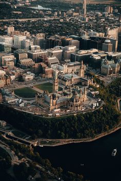 an aerial view of a large city with lots of tall buildings