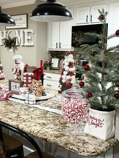 the kitchen counter is decorated for christmas with candy canes