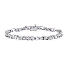 Build your collection of timeless style staples with this classic diamond tennis bracelet in sterling silver. Created in sterling silver Each diamond in this tennis-style design is artfully set to enhance size and sparkle. Wear this look solo or layered with other bracelets. Radiant with 1/4 ct. t.w. of diamonds This 7.0-inch bracelet secures with a box clasp. Style Staples, Tennis Style, Peoples Jewellers, Diamond Tennis Bracelet, Box Clasp, Tennis Bracelet Diamond, Diamond Bracelets, Tennis Bracelet, Style Design