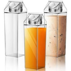 three different types of juice in glass containers