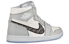 Dubbed “the most luxurious Air Jordan 1 ever”, all 8500 pairs of available Air Diors were made entirely in Italy with the finest materials and craftsmanship. The upper is constructed with white and Dior grey leather, where oblique monogrammed Swooshes enhances the opulent look. Underfoot, an translucent icy outsole completes the design. Air Dior, Nike Air Jordan 1 High, Men Dior, Jordan 1 High Og, Air Jordan 1 High, Nike Air Jordan 1, Jordan 1 High, Air Jordan 1 Mid, Jordan 1 Mid