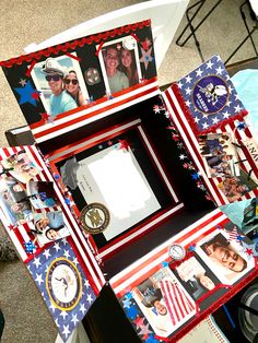 an assortment of pictures and photos are arranged on top of a table that is decorated with red, white, and blue decorations