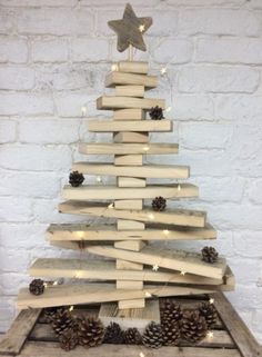 a christmas tree made out of wooden planks