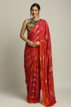 Red shadow print satin pre-draped saree. Paired with green jute blouse.
Component: 2
Pattern: Printed
Type Of Work: Shadow print
Neckline: Round
Sleeve Type: Sleeveless
Fabric: Satin, Jute
Color: Red,Green
Other Details: 
Embroidered hem
Closure: Back zipper blouse
Occasion: Party - Aza Fashions Festive Red Pre-draped Saree With Printed Motifs, Red Silk Dupatta With Digital Print, Festive Pre-draped Saree With Digital Print, Red Draped Georgette Saree, Festive Silk Draped Dupatta, Diwali Digital Print Pre-draped Saree, Designer Silk Pre-draped Saree, Silk Saree Blouse With Draped Sleeves, Red Digital Print Dupatta For Navratri