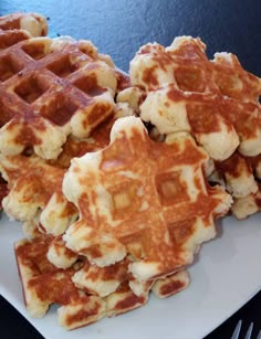 some waffles are on a white plate