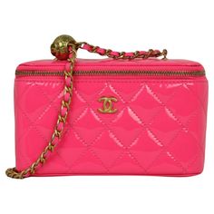 Chanel Barbie Pink Quilted Patent Pearl Crush Small Vanity Case Bag with Chain Made In: Italy Year of Production: 2023 Color: Neon pink Hardware: Goldtone Materials: Patent leather Lining: Leather Closure/Opening: Zip top Exterior Pockets: None Interior Pockets: Three credit card slots Exterior Condition: Excellent Interior Condition: Excellent Includes: Chanel box, dustbag, tag Measurements: 6.25"W x 4"H x 3"D Strap Drop: 22.5" Chanel Barbie, Neon Barbie, Vanity Case Bag, Chanel 2020, Vintage Chanel Bag, 2023 Color, Chanel Box, Small Vanity, Chanel Brand