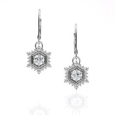 "♦ITEM DETAILS: * 5mm/.5ct (large) or 3.5mm/.15ct (small) LAB created, round, center Diamonds Please view this listing for NATURAL diamond options: * .2ctw natural Diamond halo * Lever-back Earring Hooks -- Palladium White Gold earrings will come with Platinum lever-back hooks to keep earrings completely nickel free. ------------------------------------------------------------------------------ ♥ Want to see more? Check out my shop: http://etsy.me/2qAG5JR ---------------------------------------- Hexagon Halo, Halo Diamond Earrings, Charles And Colvard Moissanite, Halo Earrings, Diamond Dangle Earrings, Deco Vintage, White Gold Earrings, Art Deco Earrings, Earring Hooks