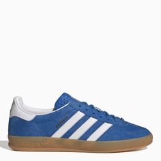 Blue suede trainer from adidas Originals featuring a round toe, white leather side stripes, a lace-up fastening, a branded tongue and a natural rubber sole. Fit: Buy one size larger than your usual size. Adidas Lace-up Skate Shoes With White Sole, Suede Round Toe Sneakers For Skateboarding, Adidas Logo White Lace-up Sneakers, Adidas Lace-up Sneakers With White Sole, Adidas Lace-up Skateboarding Sneakers, Adidas Lace-up Sneakers For Skateboarding, Suede Skate Shoes With Rubber Sole For Sports, High-top Adidas Suede Skate Shoes, Adidas High-top Suede Skate Shoes