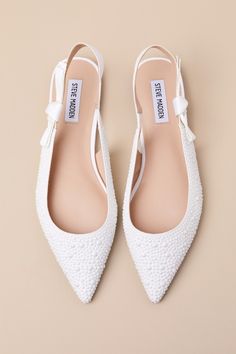 Make any day ultra-chic with the Steve Madden Olsen-P Pearl Knotted Pointed-Toe Slingback Flats! Gleaming, faux pearl studs cover soft woven fabric as it shapes a pointed-toe upper and a low-cut collar. The wide slingback strap boasts a cute, knotted detail at the outstep (and a bit of elastic at the instep for fit). 0. 25" rubber heel. Cushioned insole. Felted rubber sole has nonskid markings. Man Made Materials. Imported. Lulus | Olsen-P Pearl Knotted Pointed-Toe Slingback Flats | Size 6.5. Wedding Dress And Flats, Flats With Wedding Dress, Closed Toe Bridal Shoes, White Wedding Flats, Low White Heels, Wedding Shoes Flats For Bride, Wedding Shoes Bride Flats, Vow Renewal Attire, White Pearl Heels