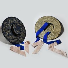 Hand-crafted Navy Blue Sisal (top of the hat) and Natural Sinamay Straw/Twine (inner hat) with Two-Tone Silk Dupion Ribbons in Royal Blue and Light Pink color from the "Sunrise in London" Hat and Headpiece Collection by Stavroula P. Spyrou A Cartwheel Hat that can be worn during your summer walk or on special occasions such as Royal Ascot, Kentucky Derby, Wedding Day. The silk embroidered ribbons can be tied in two different ways: Creating a bow or a simple tie at the front of the lower part of Blue Boater Hat With Curved Brim For Beach, Blue Mini Hats With Short Brim For Beach, Blue Mini Hat With Short Brim For Beach, Blue Mini Hats For Beach With Short Brim, Blue Mini Hats For Spring Beach Occasions, Navy Hat For Spring, One Size Fits Most, Blue Mini Beach Hats With Short Brim, Blue Mini Hats For Summer Beach, Navy Hat For Spring (one Size Fits Most)